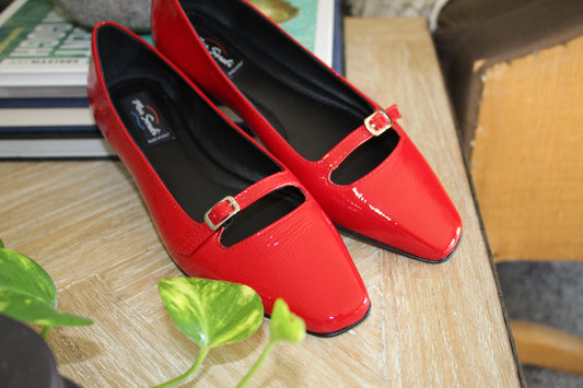 WHY RED SHOES SHOULD BE A STAPLE IN YOUR HOLIDAYS WARDROBE.